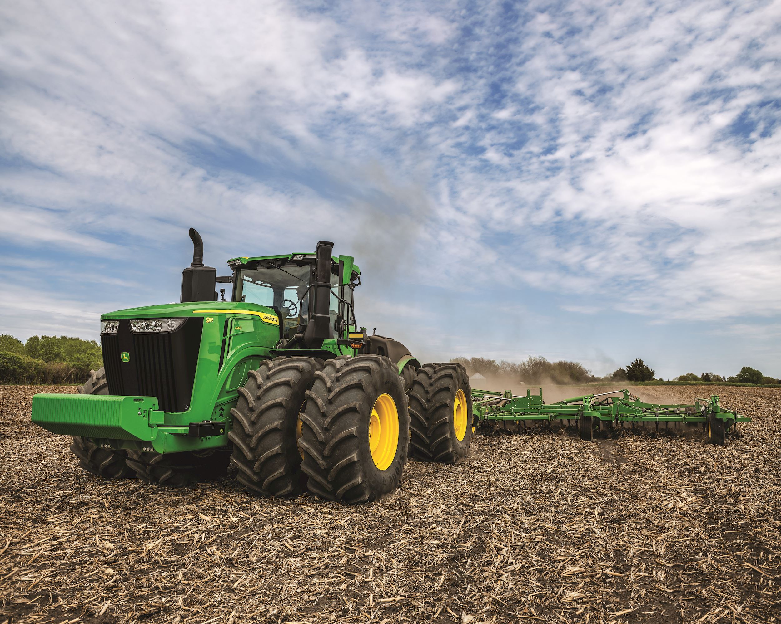 John Deere 9R 640 Tractor in field 