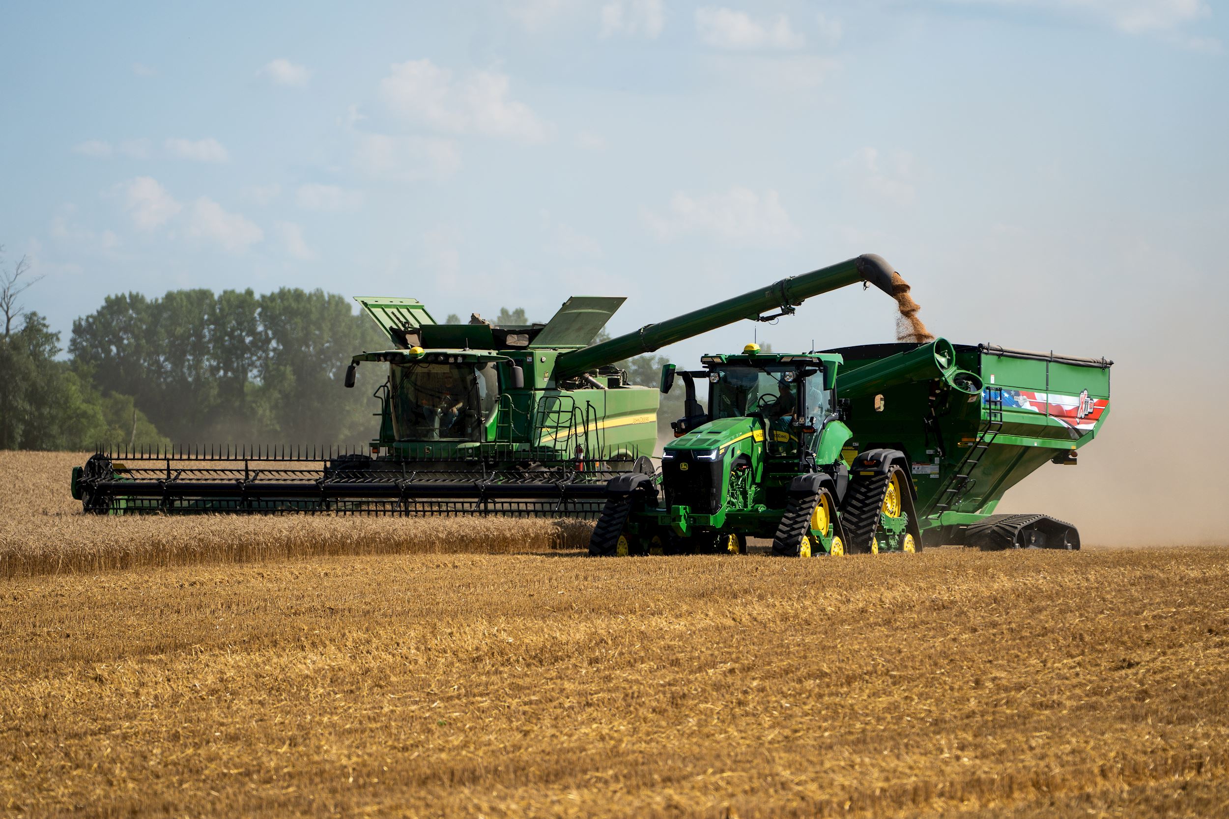John Deere combine in field 