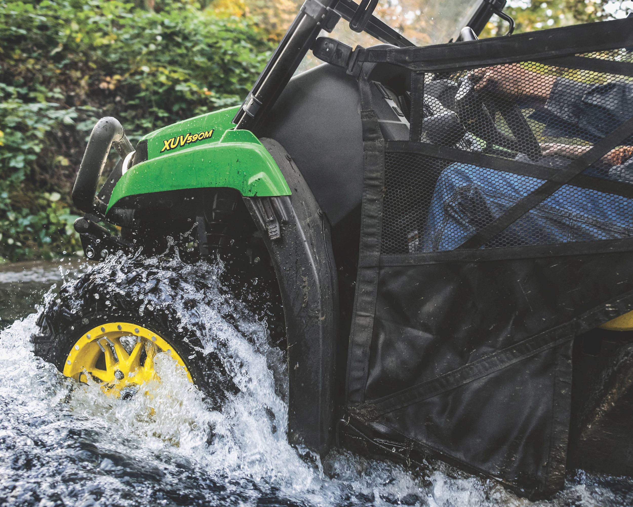 John Deere gator going through water