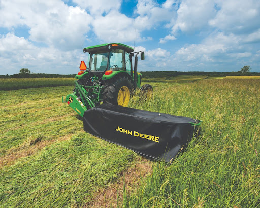  John Deere Clearing the field